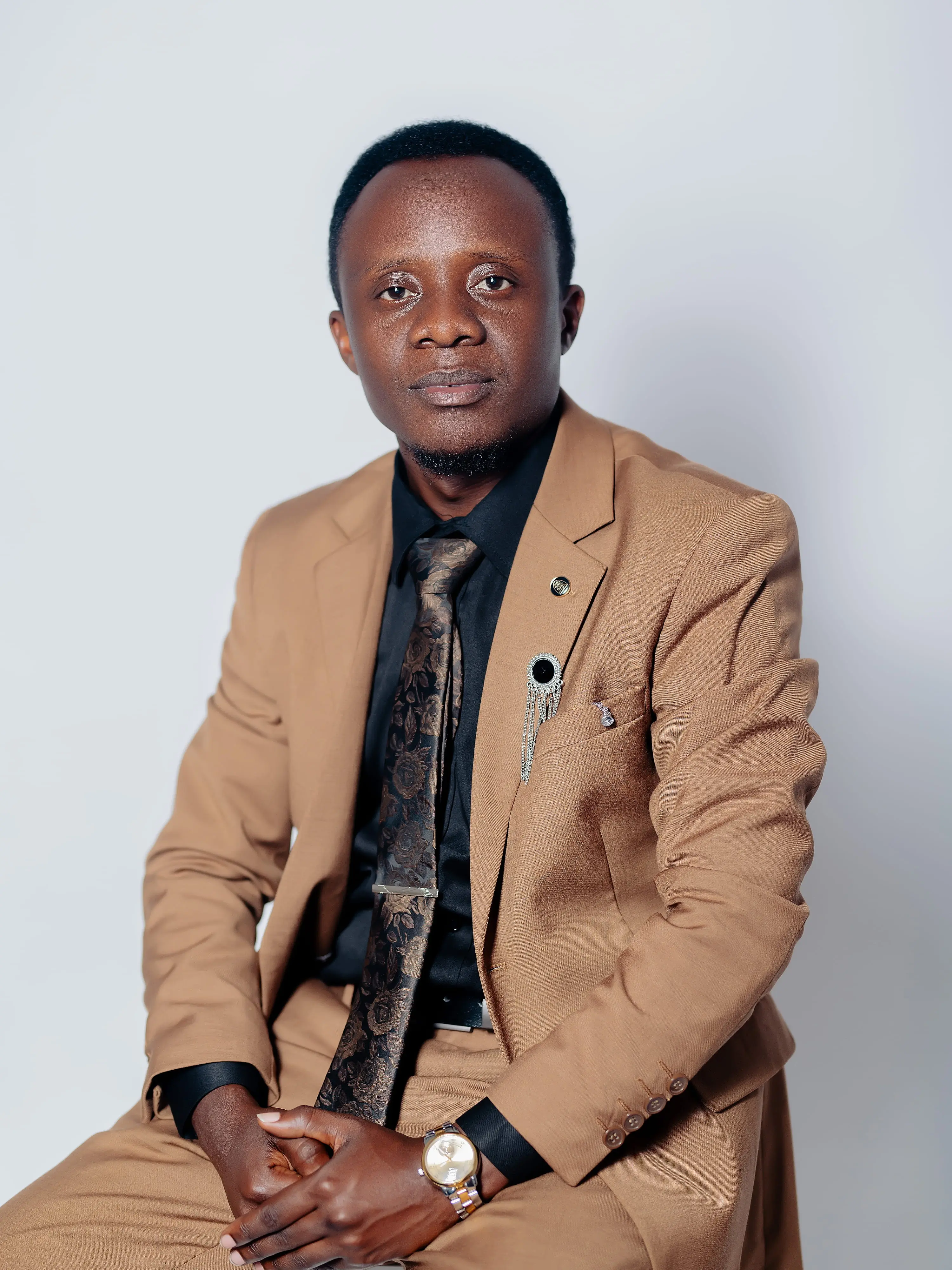 Mr. Jean Nepomuscène NIZEYIMANA